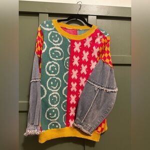 Fun and unique sweater with denim sleeves size medium